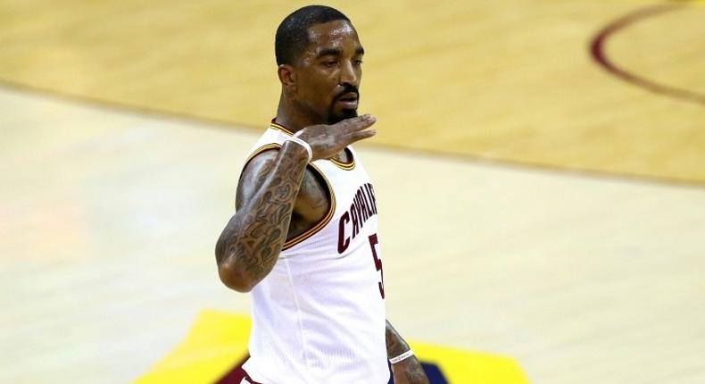 J.R. Smith #5 of the Cleveland Cavaliers reacts after a basket in the first half against the Golden State Warriors in Game 6 of the 2016 NBA Finals at Quicken Loans Arena on June 16, 2016 in Cleveland, Ohio