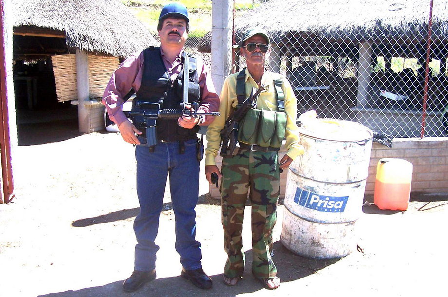 Guzmán, left, the leader of Mexico's Sinaloa drug cartel, seen next to an unidentified man in this undated handout photo found after a raid on a ranch, released to Reuters in 2011.