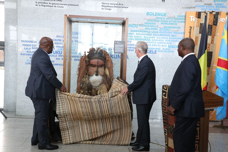 DRC Congo President Felix Tshisekedi and King Philippe - Filip of Belgium unveil the Katuungu mask coming from AfricaMuseum in Tervuren, during a visit to the National Museum, MNRDC, Musee national de la Republique democratique du Congo, in Kinshasa, during an official visit of the Belgian Royal couple to the Democratic Republic of Congo, Wednesday 08 June 2022. [Photo by NICOLAS MAETERLINCK/BELGA MAG/AFP via Getty Images]