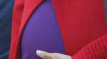 Meghan Markle w czerwonym płaszczu