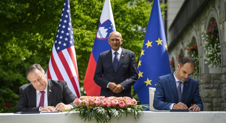 US Secretary of State Mike Pompeo (left) and Slovenian Foreign Minister Anze Logar (right), sign declaration to bar untrusted companies -- an apparent reference to Chinese telecoms giant Huawei -- from 5G systems