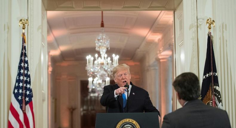 Aides to President Donald Trump, seen in a heated exchange with CNN correspondent Jim Acosta, stepped up attacks on the media after a two-year investigation concluded he did not collude with Russia in the 2016 election
