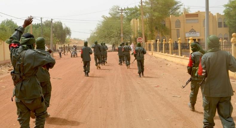 Malian soldiers patrol the northern city of Gao in February 2017