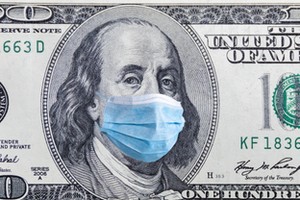 US quarantine, 100 dollar banknote with medical mask. The concept of epidemic and protection against coronavrius.