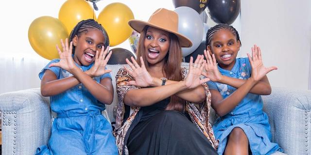 Grace Msalame with her Twin daughters 