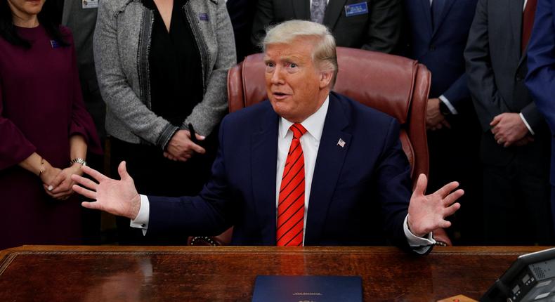 U.S. President Donald Trump reacts to a question from a reporter following a signing ceremony for the Supporting Veterans in STEM Careers Act inside the Oval Office of the White House in Washington, U.S., February 11, 2020.  REUTERS/Tom Brenner