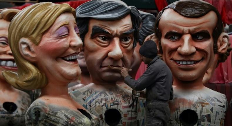 Sparring images: French presidential candidates (from left) Marine Le Pen, Francois Fillon and Emmanuel Macron will be seeking to paint themselves as leadership material in their first TV debate on Monday