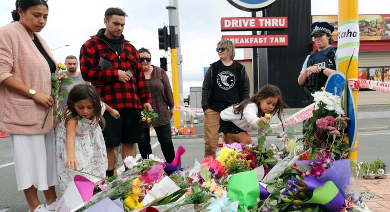 People from all walks of life arrived at the police barriers near the mosques on Saturday to pay their respects and to show support for New Zealand's 50,000 Muslims