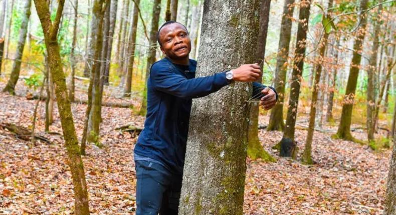 Ghanaian environmentalist sets new Guinness World Record by hugging 1,123 trees in one hour