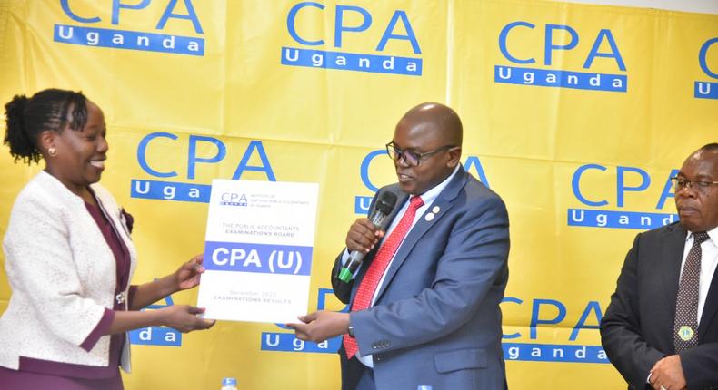 A member of ICPA being rewarded