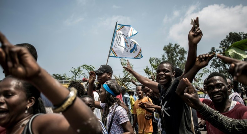 Supporters of Felix Tshisekedi celebrate after he was named winner of DR Congo's presidential election, while elsewhere supporters of Martin Fayulu took to the streets in protest