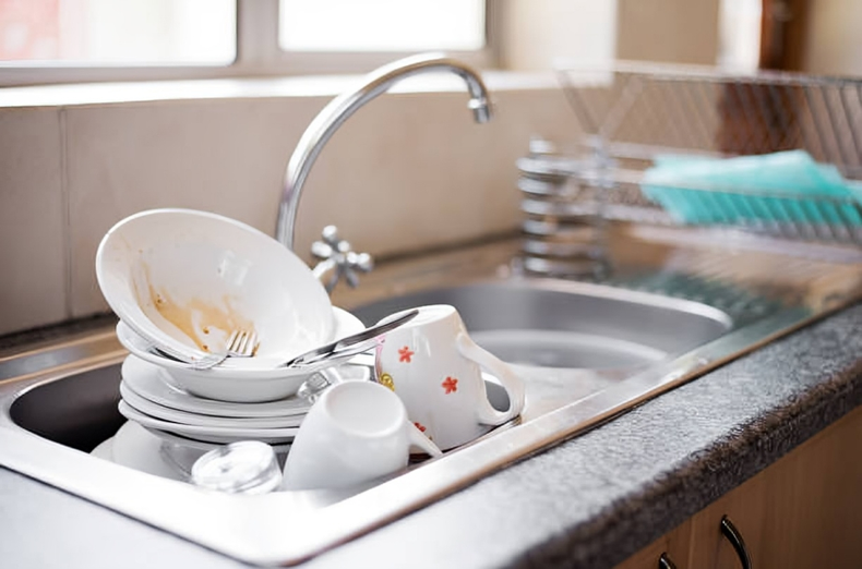 Dirty dishes in a sink