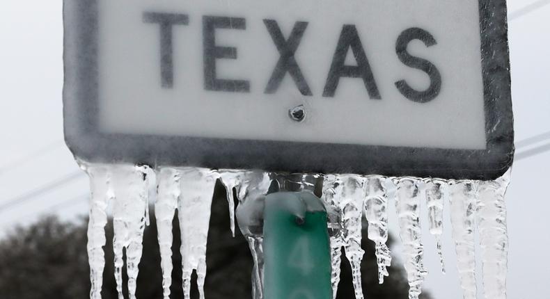 Icicles hang off the State Highway 195 sign in Killeen, Texas. Photo by Joe Raedle/Getty
