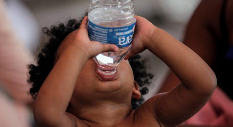 A child drinks bottled water in Reynosa, Mexico.Daniel Becerril/Reuters
