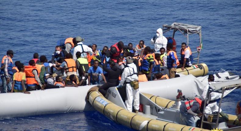 Migrants are rescued by the Italian Navy in the Mediterranean Sea in this September 2, 2015 handout courtesy of the Italian Navy.  REUTERS/Italian Navy/Handout via Reuters