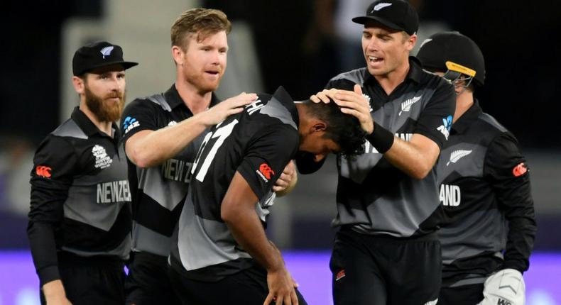 Big blow: New Zealand players celebrate the dismissal of India captain Virat Kohli in their T20 World Cup clash Creator: Aamir QURESHI
