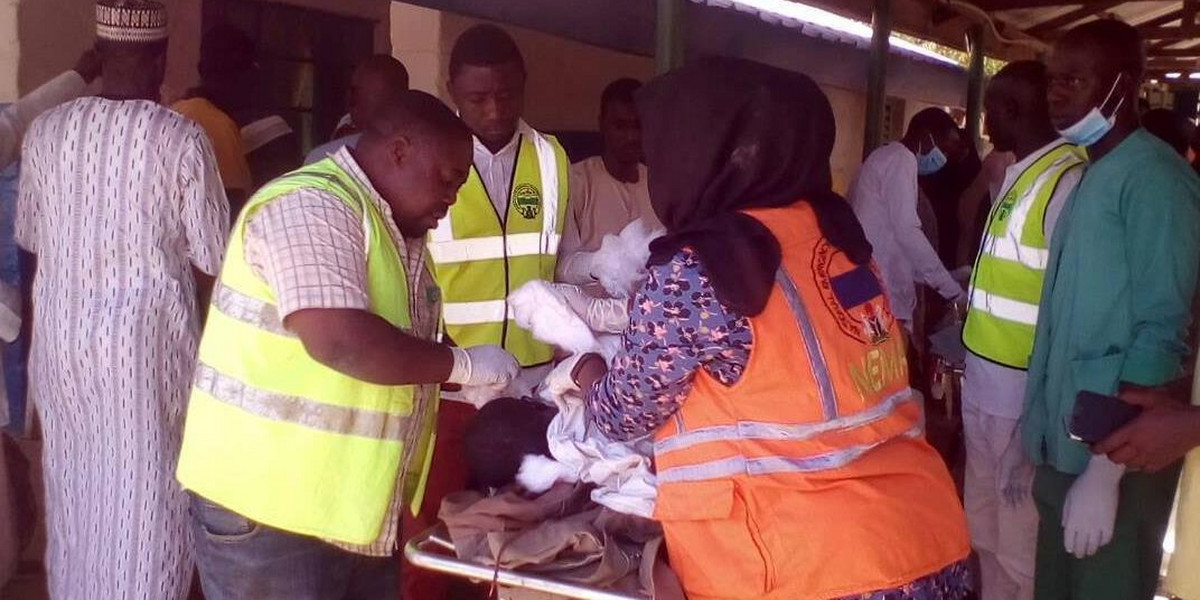 A man inspects the damage inside a mosque at the site of a suicide bomber attack in Mubi in Adamawa state