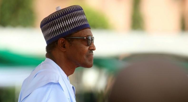 Nigeria's President Muhammadu Buhari, pictured October 1, 2018, expressed concern that Nigerians were too frequently resorting to violence over misunderstandings after fighting broke out in a market following a dispute among wheelbarrow porters