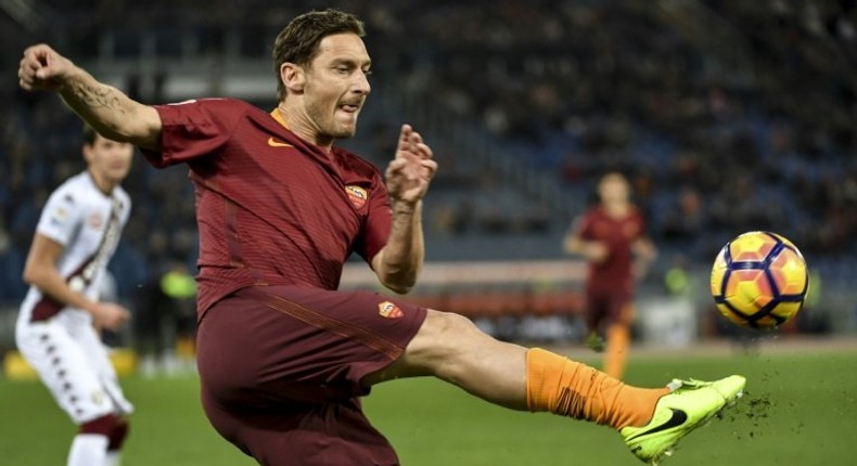 Roma's forward Francesco Totti kicks the ball on February 19, 2017