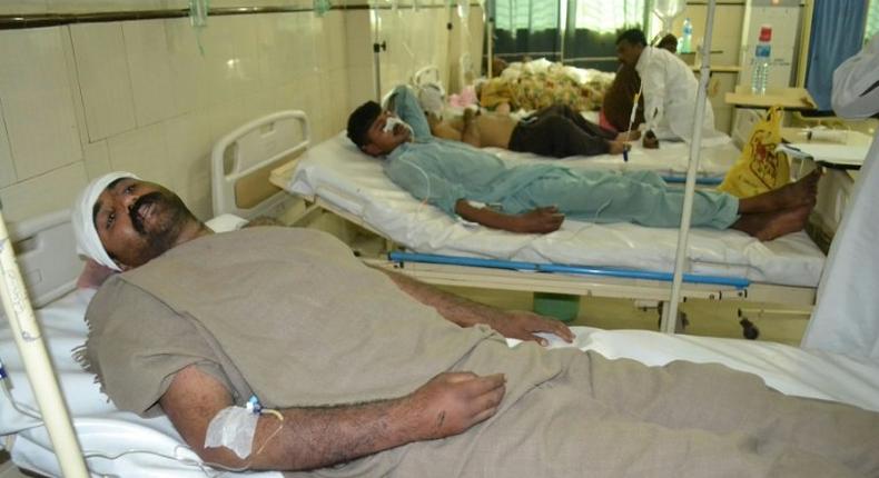 Victims of the Pakistan shrine attack being treated in hospital