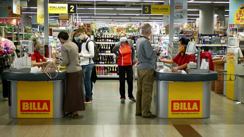 PRAGUE, CZECH REPUBLIC, JUNE 22, 2020: Coronavirus mask face cash register shopping carts food cente