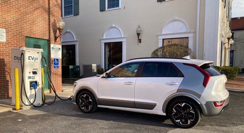 The Kia Niro EV charges at an EVgo charging station.Tim Levin/Insider