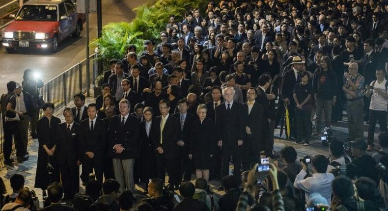 Lawyers and law students take part in a silent march in protest at a ruling by China which effectively bars two pro-independence legislators from taking office in Hong Kong on November 8, 2016