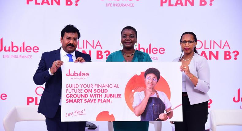 Jubilee Life CEO Sumit Kumar Gaurav together with COO Dorcus Kuhimbisa and Ms Sharon Tumushabe at the product launch