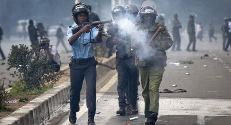 File image of police using teargas to disperse protesters