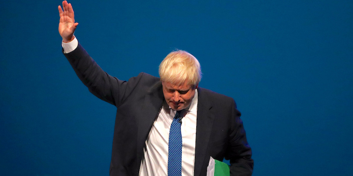 Boris Johnson swears loyalty to Theresa May as PM snubs his speech