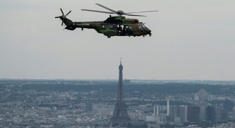 A French Eurocopter AS 532 Cougar flying during a rehearsal ahead of the Bastille day military air parade