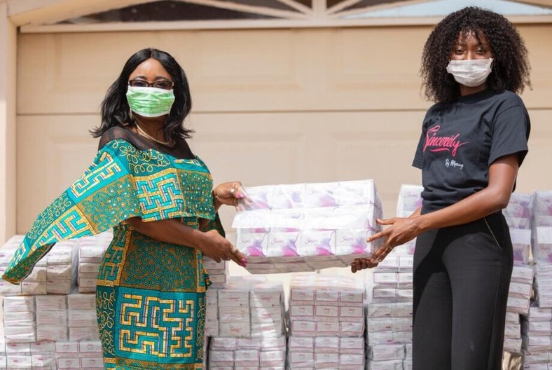 The Minister for Gender, Children and Social Protection, Mrs Cynthia Morrison receiving 2000 ‘Sincerely’ sanitary pads from Ruth Quarshie, a representative of Sincerely Ghana Limited