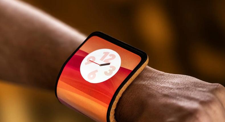 Motorola's adaptive display smartphone concept can be folded multiple ways to stand upright or even attached to your wrist like a slap bracelet.Motorola