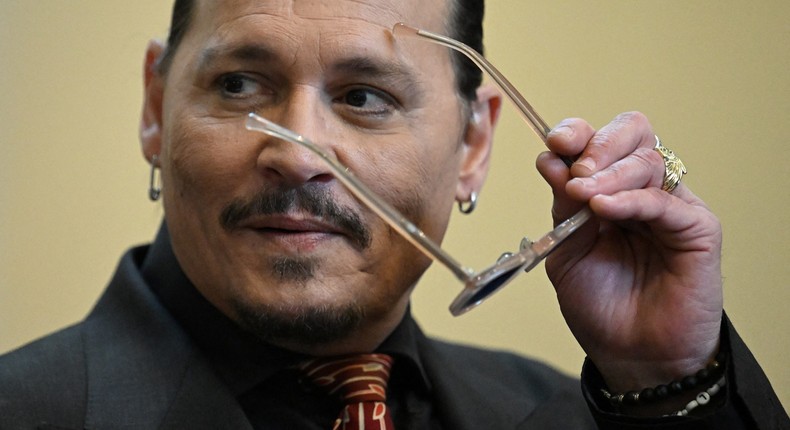 Actor Johnny Depp looks on in the courtroom at Fairfax County Circuit Court during his defamation case against Amber Heard, in Fairfax, Virginia, on May 3 2022.Jim Watson/Pool via REUTERS