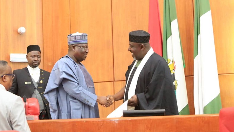 President of the Senate, Senator Ahmad Lawan swears in Rochas Okorocha [Twitter/@SPNigeria]