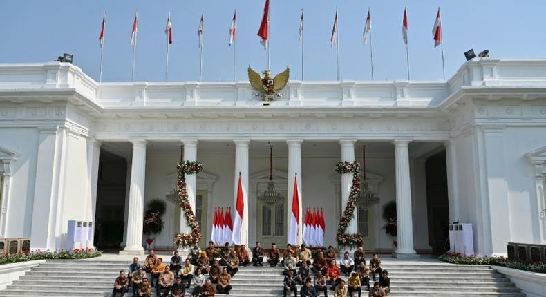 Indonesian President Joko Widodo introduced his new cabinet on the palace steps