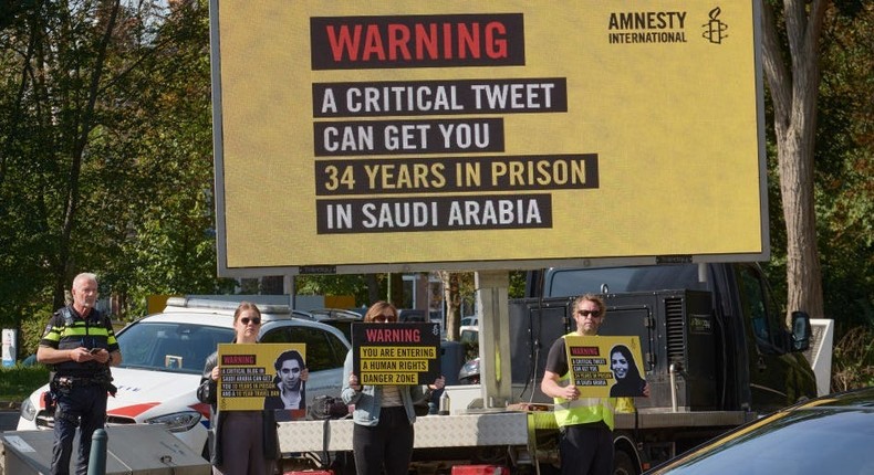 Human rights activists welcome diplomats with protest boards as Saudi Arabia marks its statehood day with a reception in an hotel on September 22, 2022 in The Hague, Netherlands.Pierre Crom/Getty Images