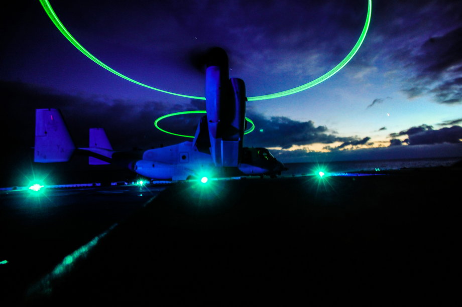 An MV-22 Osprey assigned to the Marine Medium Tiltrotor Squadron 166 takes off during flight operations aboard the amphibious-assault ship USS Boxer.