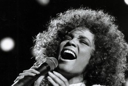 Singer Whitney Houston performing in 1986