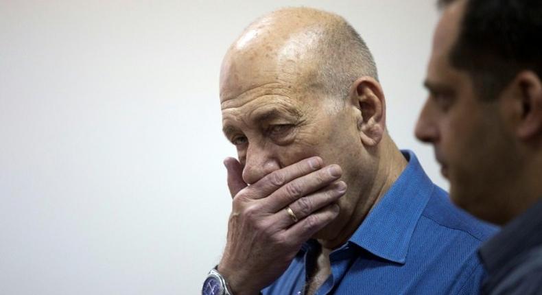 Former Israeli Prime Minister Ehud Olmert gestures during his trial in Jerusalem on May 25, 2015