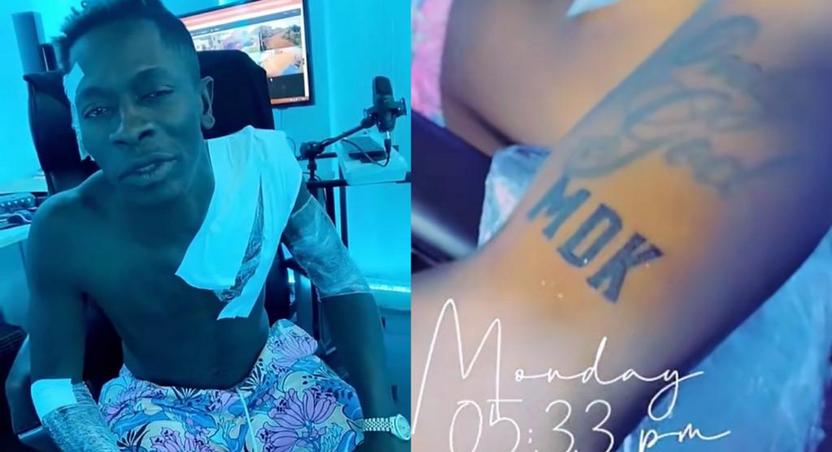 Shatta Wale tattoos Medikal's name on his body (WATCH)