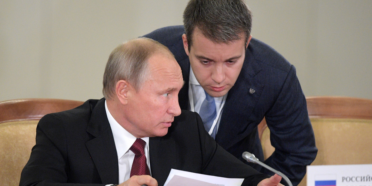 Prezydent Rosji Władimir Putin i minister ds. komunikacji i mass mediów Nikolai Nikiforov