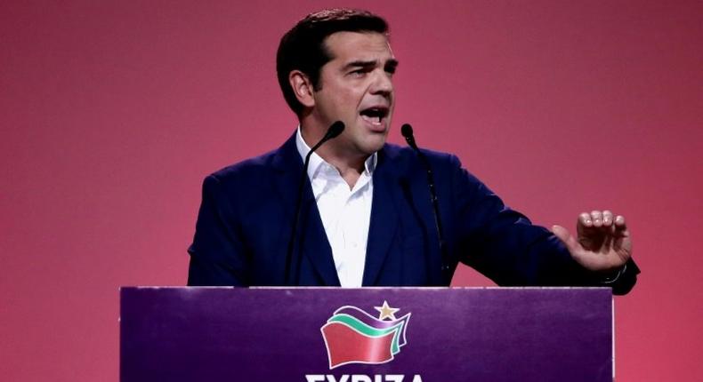 Greek Prime Minister Alexis Tsipras has shrugged off criticism that he abandoned Syriza's radical left-wing principles when he signed Greece up for a multi-billion EU austerity bailout