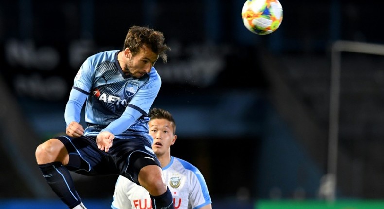 Sydney FC's Adam le Fondre displayed his enduring predatory instincts to keep Shanghai SIPG at bay