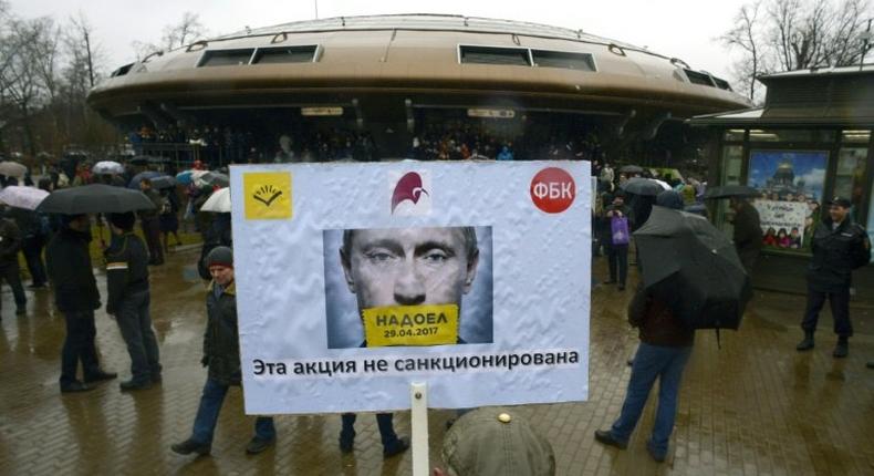 Demonstrators gathered in Saint Petersburg on Sunday to protest Vladimir Putin's expected candidacy in 2018 elections