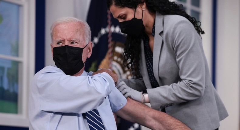 President Joe Biden receives his first COVID-19 booster shot at the White House last September.