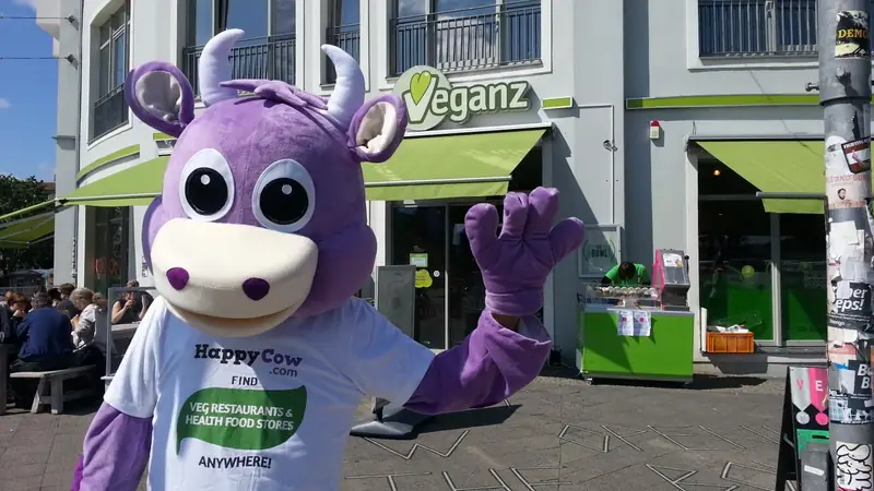 HappyCow in front of Veganz in Berlin