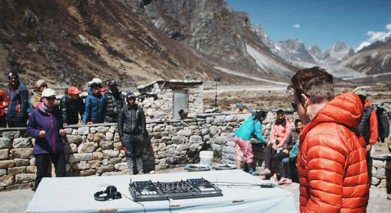 Influential British DJ Paul Oakenfold has reached Mount Everest's base camp where he plans to host the highest party on earth, performing a set at 5,380 metres (17,600 feet)