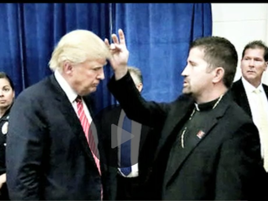 Rev. Fr. Emmanuel Lemelson performing a blessing on Donald Trump.