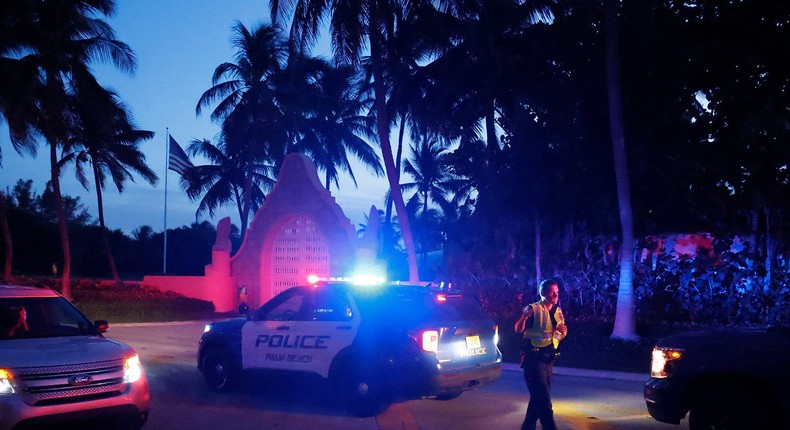 Police direct traffic outside an entrance to former President Donald Trump's Mar-a-Lago estate, Monday, Aug. 8, 2022, in Palm Beach, Florida.